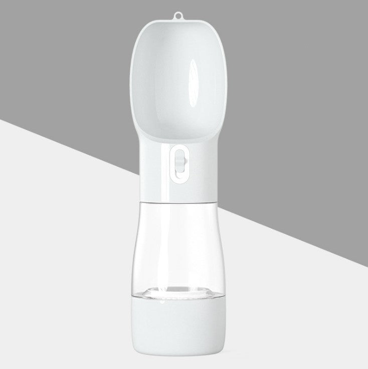 Portable dog water dispenser with a bowl and bottle design for traveling, hiking, and outdoor use.