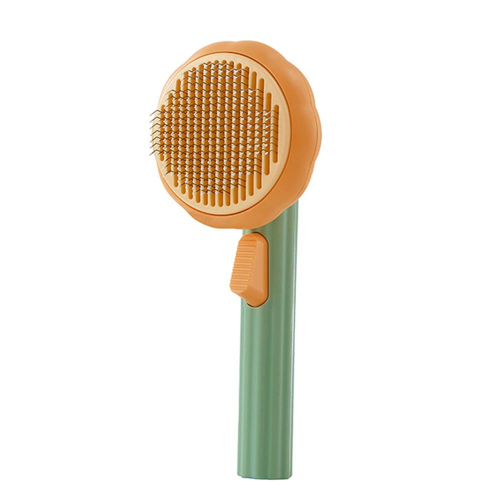 Cute pumpkin pet grooming comb with fine wire bristles for easy detangling and gentle grooming.