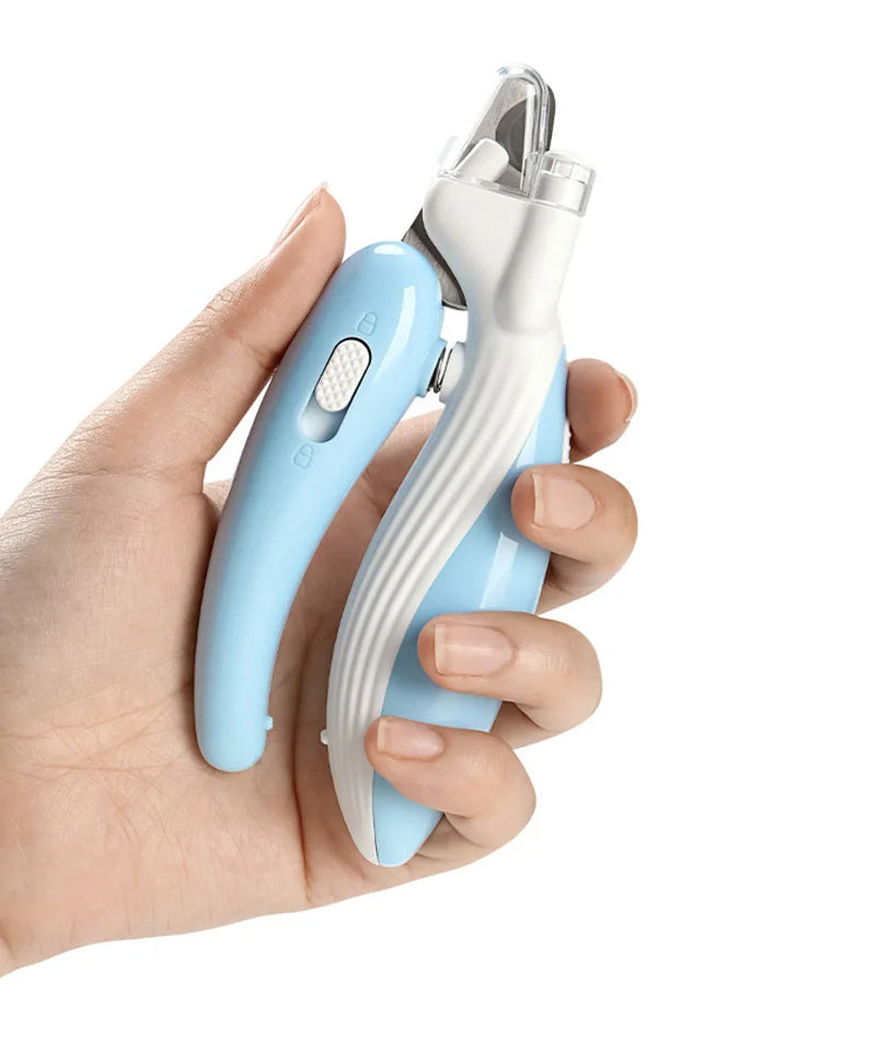 LED electric pet nail clippers held in a hand, designed for safe trimming of small pets' nails.