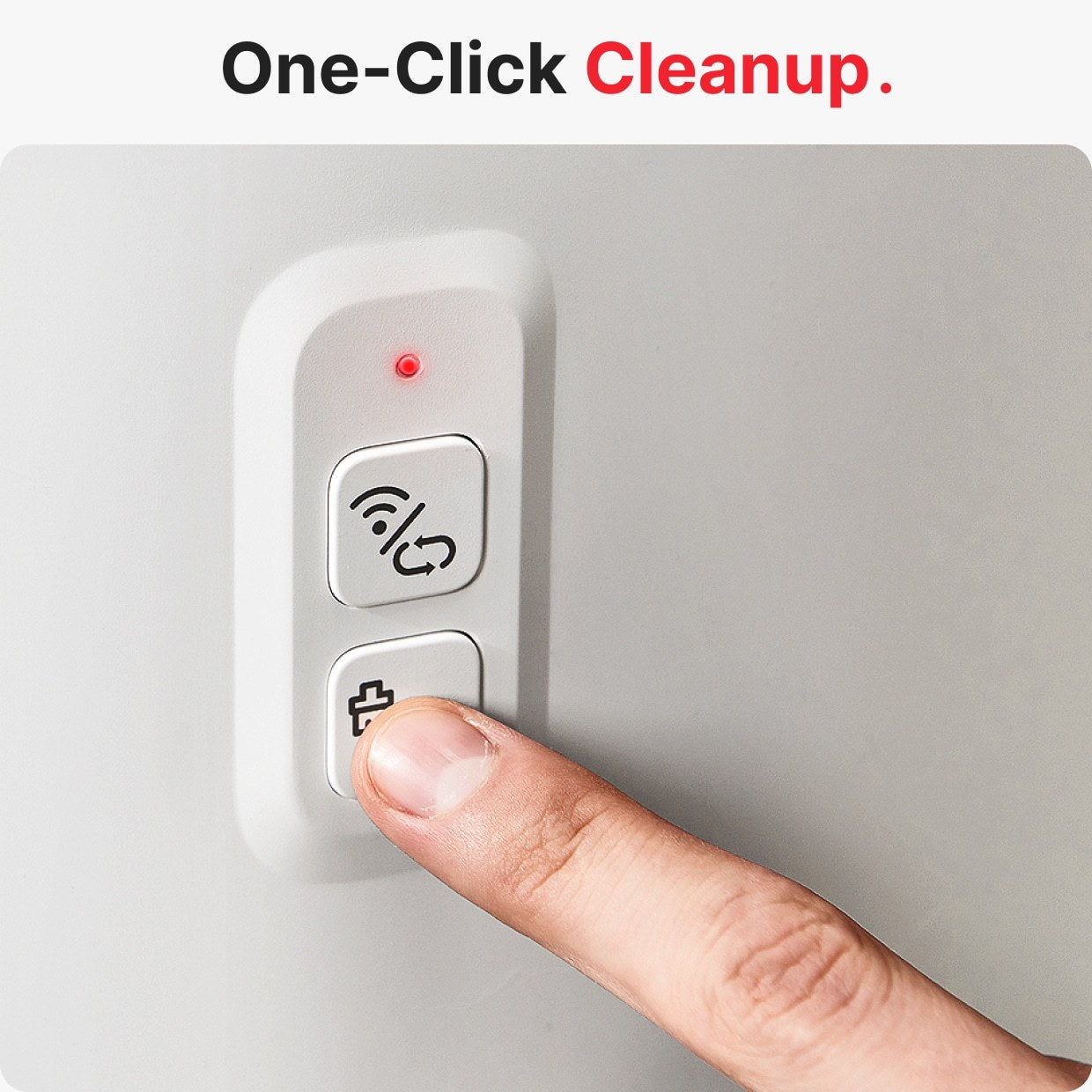 User activating the one-click cleanup feature on a smart self-cleaning litter box.
