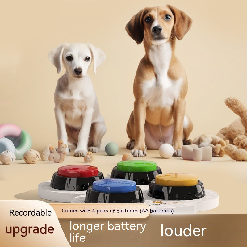 Two dogs sitting beside colorful recordable voice buttons, showcasing pet toy features with longer battery life.