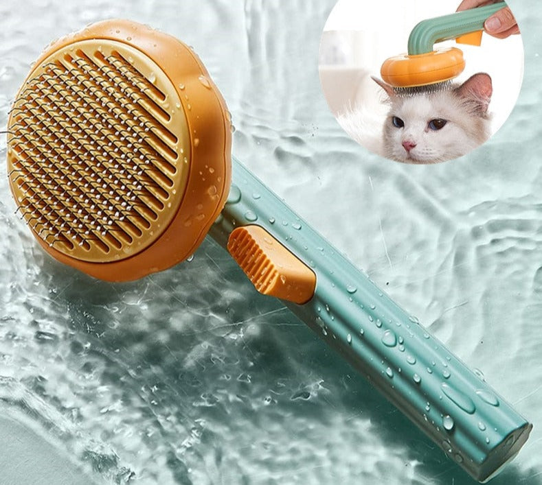 Cute Pumpkin Pet Grooming Comb with bent wire bristles, perfect for detangling fur and keeping pets comfortable.